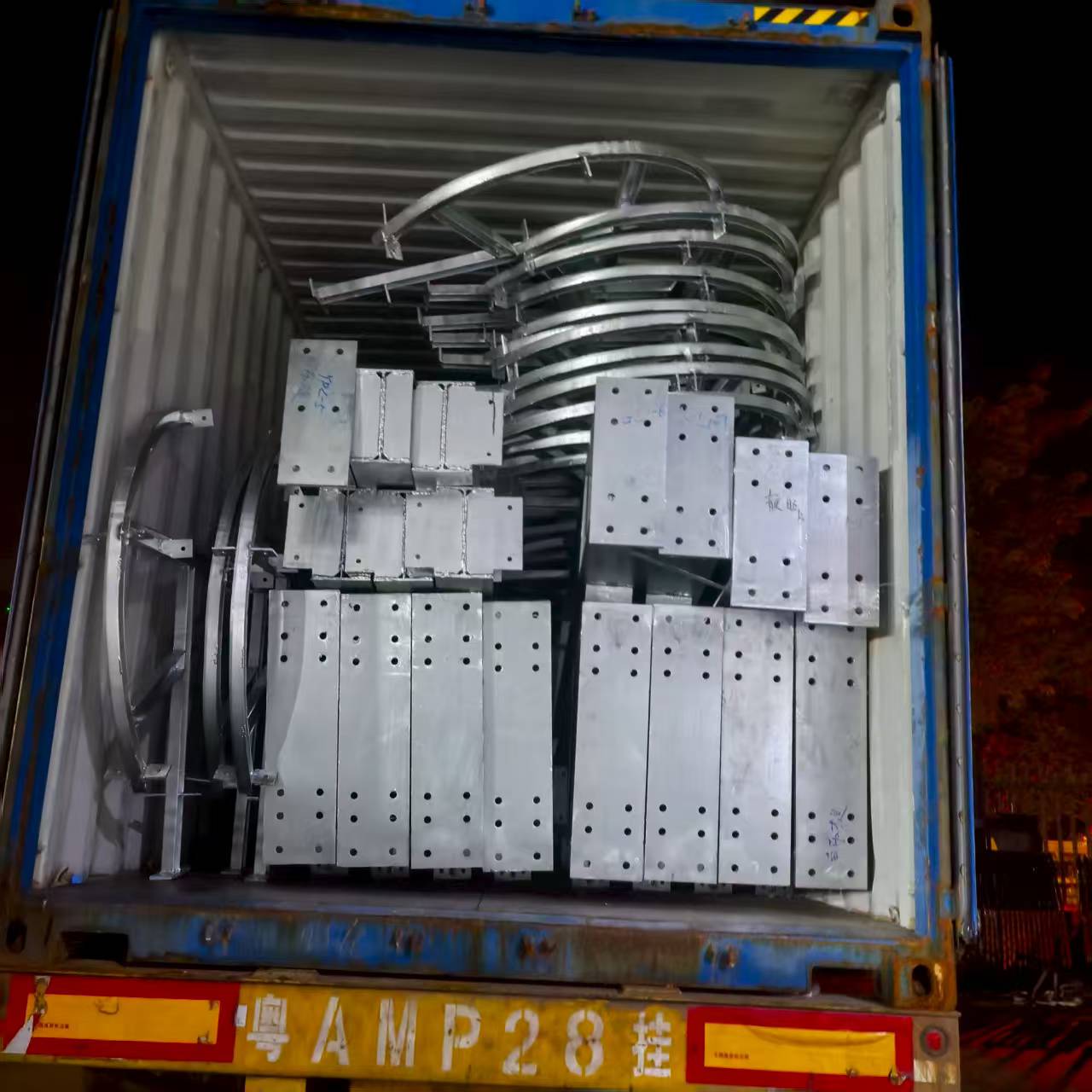 Containerized steel members prepared for shipment to the Djibouti project site