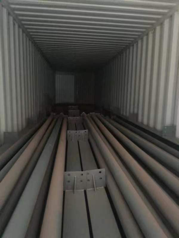 Steel components loaded inside a shipping container for the Thailand steel workshop project