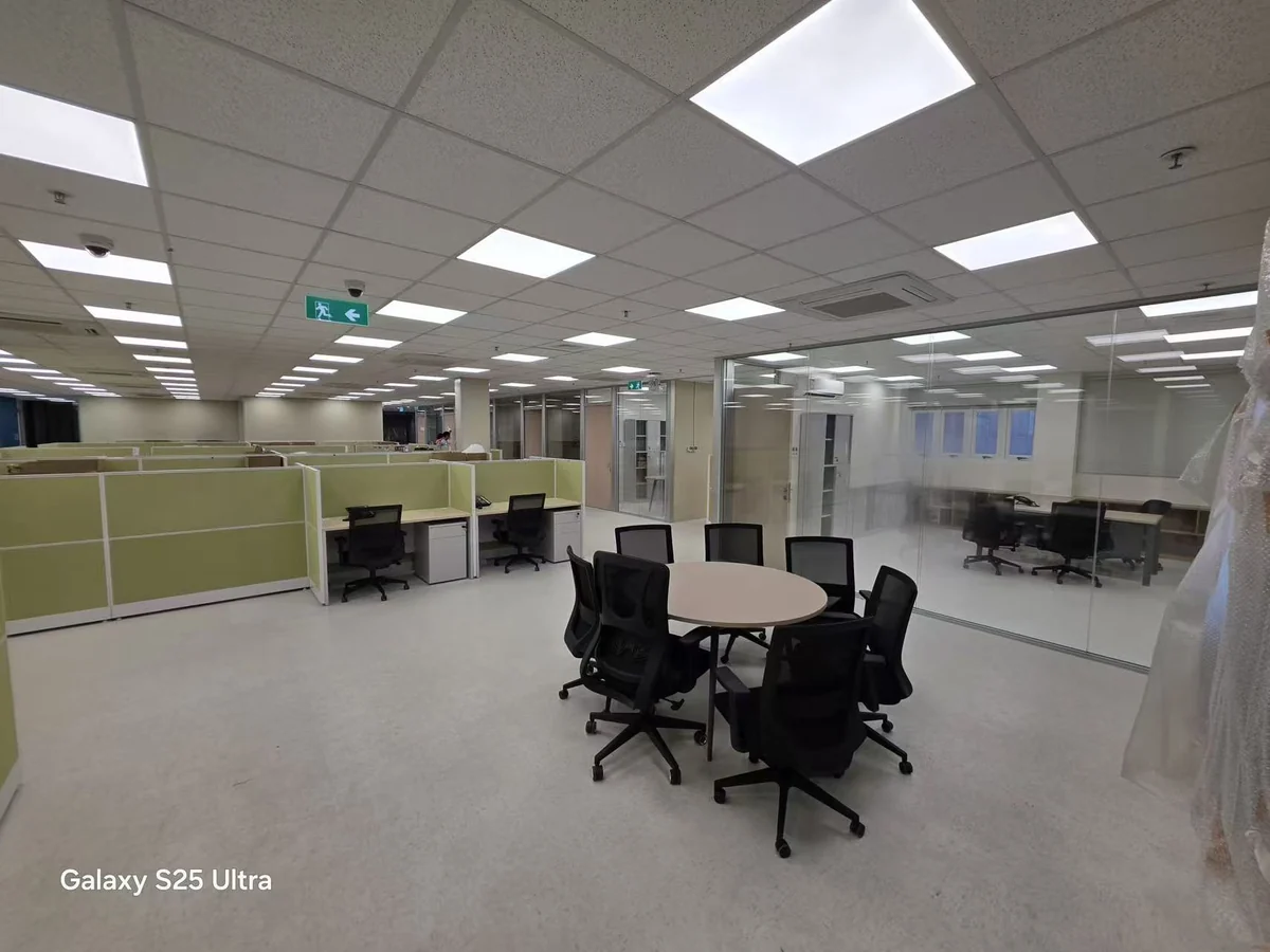 Open office workspace inside a steel structure office building