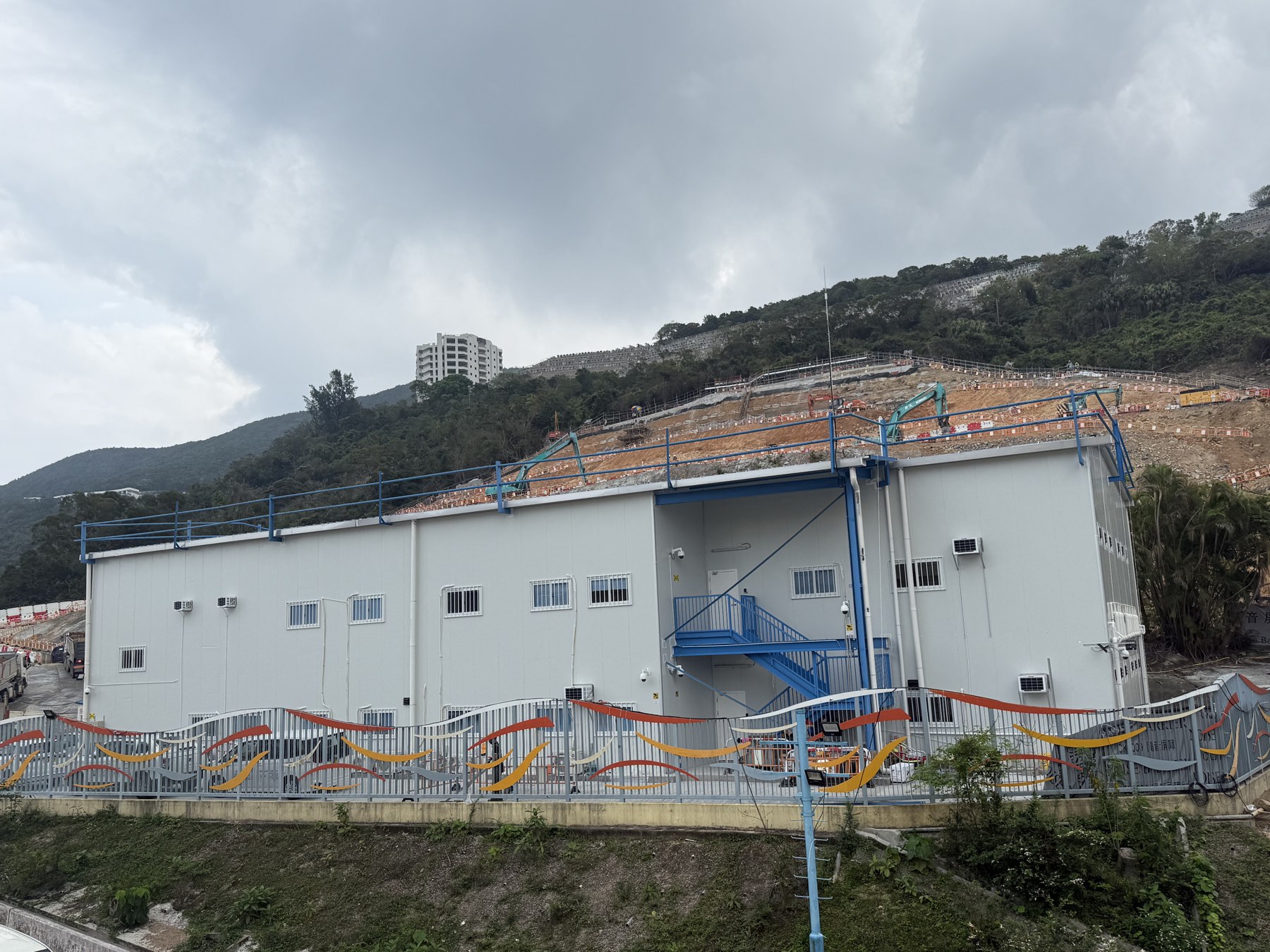 Finished side view of the Hong Kong Chai Wan steel structure building with exterior stair and windows