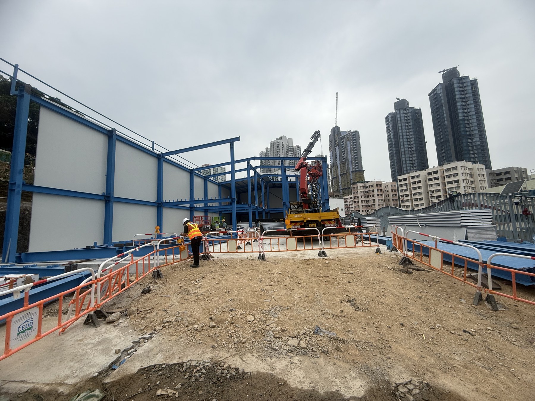 Blue steel frame erection stage for the Hong Kong Chai Wan steel structure office project